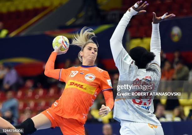 Netherland's Estevana Polman shoots over Spain's Gassama Kaba during the 2nd round, group II match between Netherlands and Spain during the Women's...