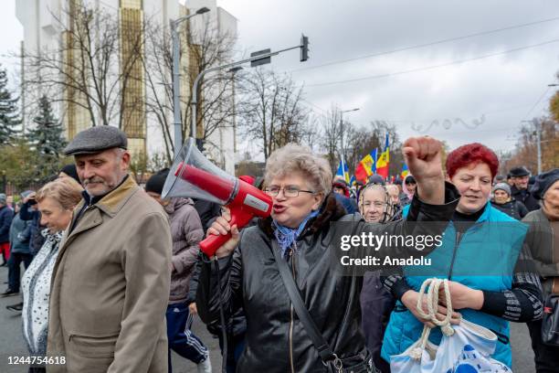 Several thousand protesters calling Moldova's pro-Western leaders to leave the high office march toward the Constitutional Court for the ninth...