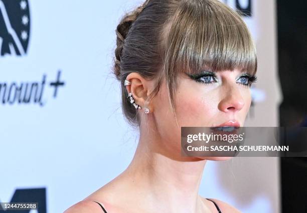 Singer-songwriter Taylor Swift poses on the red carpet upon arrival for the 2022 MTV Europe Music Awards in Düsseldorf, on November 13, 2022.