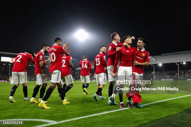 Alejandro Garnacho of Manchester United celebrates with team mates after scoring his side's second goal during the Premier League match between...