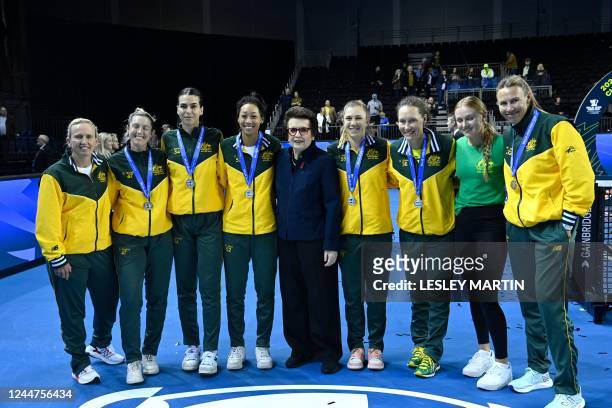 The Australia team and coaches pose for a photograph with former US tennis legend Bilie Jean King after Switzerland's victory over Australia in the...