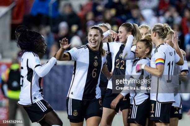 Jule Brand of Germany celebrates her goal with teammates in the first half of the women's international friendly match against the United States at...