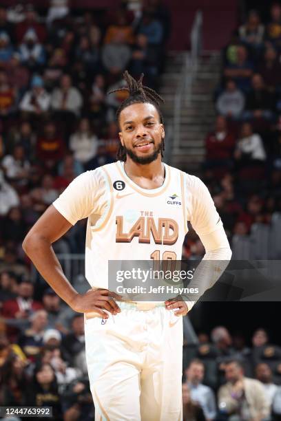 Darius Garland of the Cleveland Cavaliers smiles and looks on during the game against the Minnesota Timberwolves on November 13, 2022 at Rocket...