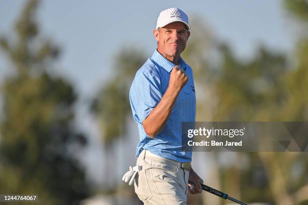 Steven Alker of New Zealand fist pumps on the 18th green after winning the Charles Schwab Cup during the final round of the PGA TOUR Champions...