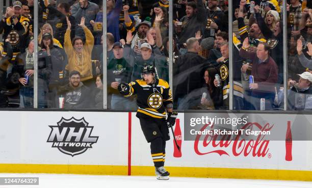 Brad Marchand of the Boston Bruins celebrates his goal against the Vancouver Canucks during the second period at the TD Garden on November 13, 2022...