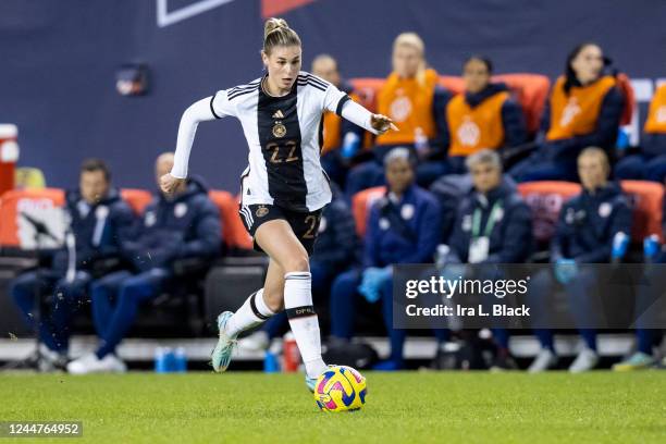 Jule Brand of Germany takes the ball down the pitch in the first half of the women's international friendly match against the United States at Red...