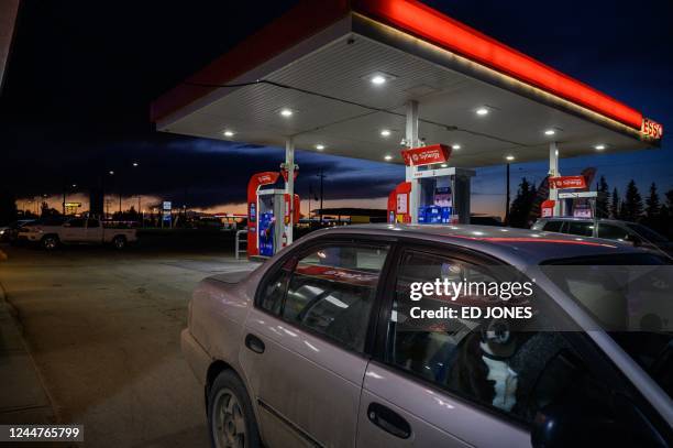 General view shows a gas petrol station in Grassland, Alberta, on September 5, 2022. - At Fort McKay near Fort McMurray in western Canada, in the...