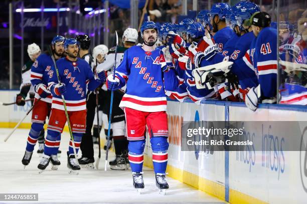 Chris Kreider of the New York Rangers comes to the bench after scoring during the game against the Arizona Coyotes on November 13, 2022 at Madison...