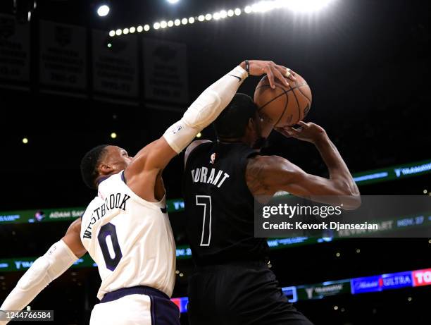 Russell Westbrook of the Los Angeles Lakers blocks a layup by Kevin Durant of the Brooklyn Nets during the first half of the game at Crypto.com Arena...