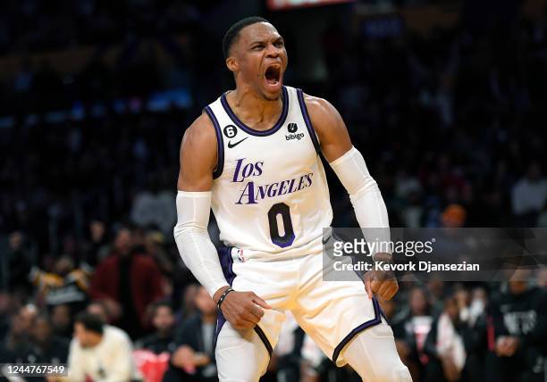 Russell Westbrook of the Los Angeles Lakers celebrates after a slam dunk against Kevin Durant of the Brooklyn Nets during the second half of the game...