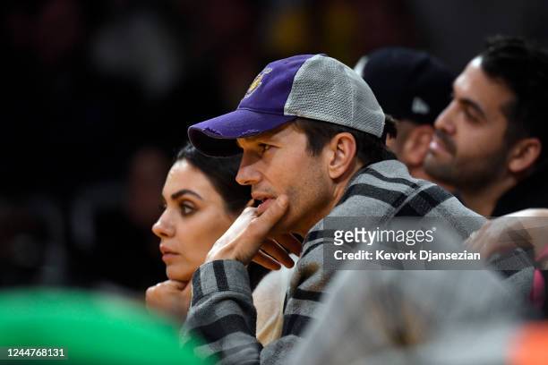 Mila Kunis and Ashton Kutcher attend a basketball between the Los Angeles Lakers and the Brooklyn Nets at Crypto.com Arena on November 13, 2022 in...
