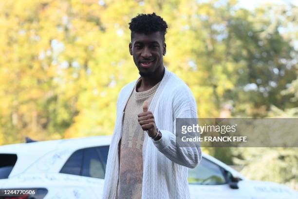 France's forward Kingsley Coman gives a thumb up as he arrives for a get-together, two days before the French national team leave for the upcoming...