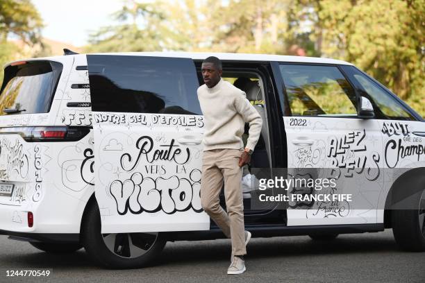 France's forward Ousmane Dembele arrives for a get-together, two days before the French national team leave for the upcoming Qatar 2022 World Cup...