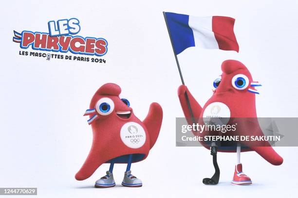 This photograph taken on November 14 shows the newly unveiled Paris 2024 Olympic and Paralympic mascots during their official presentation in...