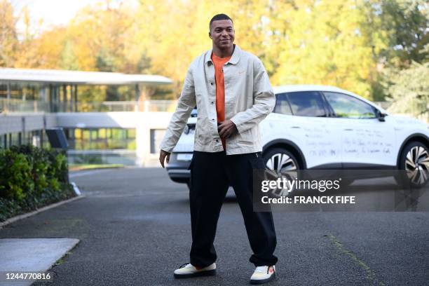 France's forward Kylian Mbappe arrives for a get-together, two days before the French national team leave for the upcoming Qatar 2022 World Cup...