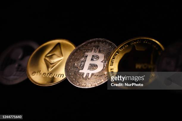 Representation of cryptocurrencies are seen in this illustration photo taken in Krakow, Poland on November 14, 2022.