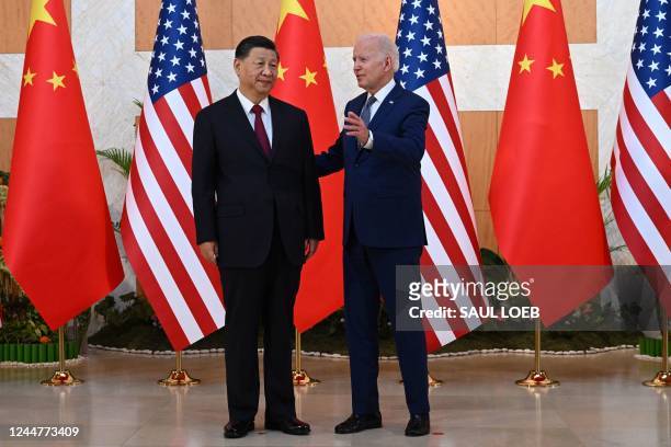 President Joe Biden and Chinese President Xi Jinping hold a meeting on the sidelines of the G20 Summit in Nusa Dua on the Indonesian resort island of...