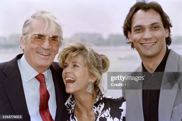 American actor Gregory Peck, American actress Jane Fonda and American actor Jimmy Smits pose for photographers after the presentation of their movie...