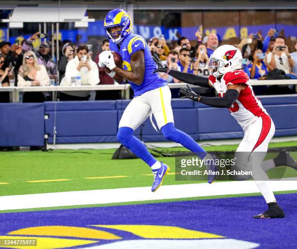Los Angeles, CA Rams wide receive Van Jefferson, #12, left, catches a touchdown pass from John Wolford in the final seconds of the game past...