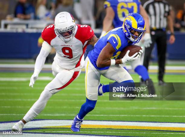 Los Angeles, CA Cardinals inside linebacker Isaiah Simmons, #9, left, chases Rams wide receive Van Jefferson, #12 during the first half at SoFi...