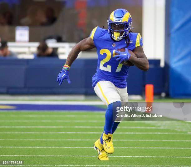 Los Angeles, CA Los Angeles, CA Rams running back Darrell Henderson Jr. #27, rushes for yardage against the Cardinals in the second half at SoFi...