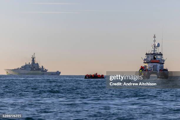 Small boat packed with people is rescued in English waters by BF Defender operated by Border Force and overseen by HMS Severn in the middle of the...