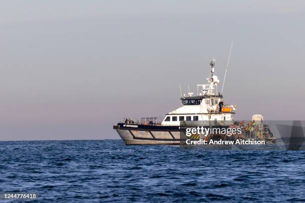 Small boat packed with people is rescued in English waters by BF Defender operated by Border Force and overseen by HMS Severn in the middle of the...