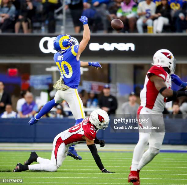 Los Angeles, CA Rams wide receiver Cooper Kupp leaps to attempt to make a catch on a high throw from John Wolford and injured his right leg as he was...