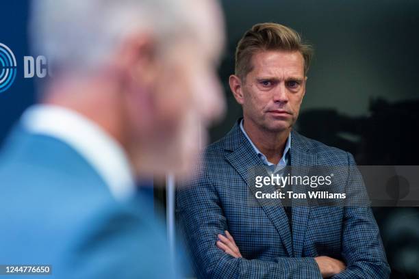 Randy Florke, right, looks on as his husband Democratic Congressional Campaign Committee Chair Rep. Sean Patrick Maloney, D-N.Y., speaks during a...