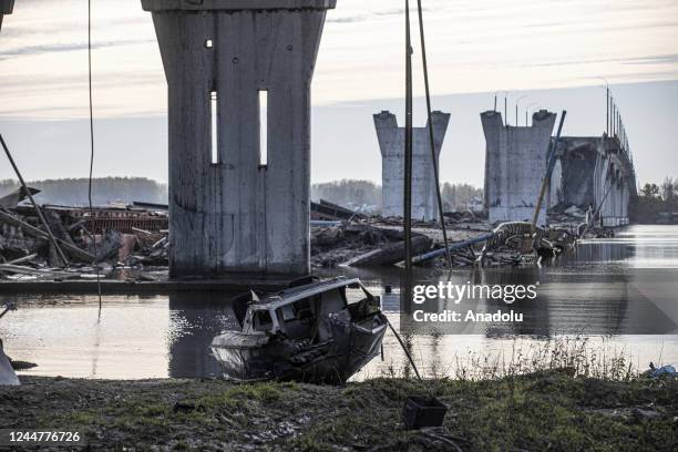 Antonovski Bridge, which is allegedly demolished to stop Ukrainian forces from crossing the Dnieper River as Russian forces withdrew to its left side...