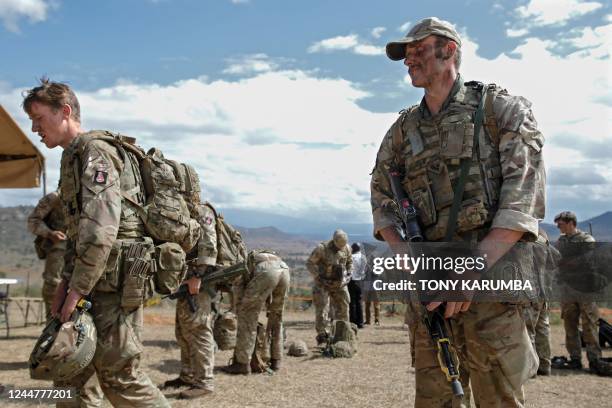 Soldiers that are part of a training battle group comprising 1 Rifles, 1 Yorks and 1 Irish Guards battalions prepare to take a break following a...