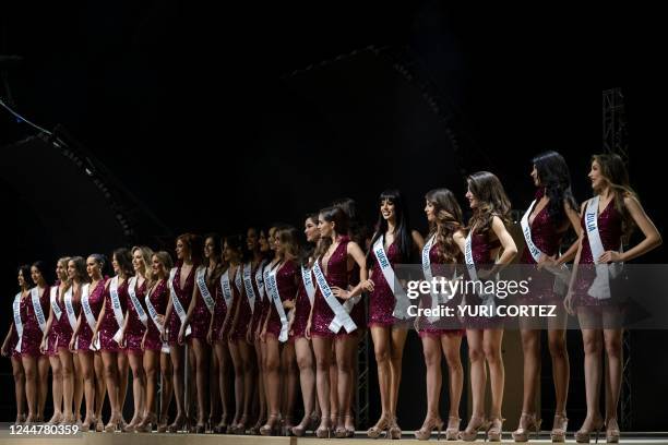Candidates from 23 Venezuelan states and a representative from the capital district aspiring to the title of Miss Venezuela pose during a rehearsal...
