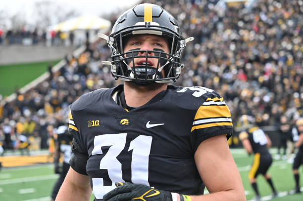 Iowa middle linebacker Jack Campbell warms up before a college football game between the Wisconsin Badgers and the Iowa Hawkeyes, November 12