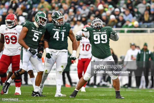 Michigan State Spartans defensive tackle Jalen Hunt celebrates a tackle during a college football game between the Michigan State Spartans and...
