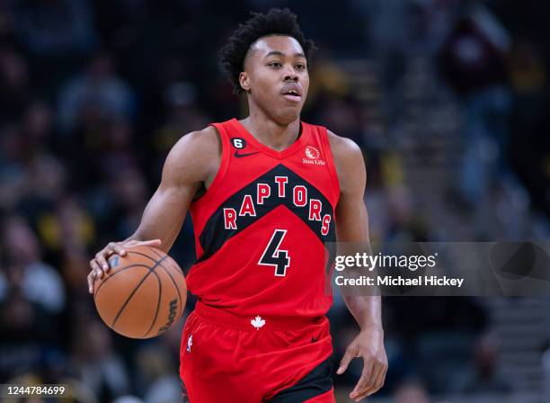 Scottie Barnes of the Toronto Raptors brings the ball up court during the game against the Indiana Pacers at Gainbridge Fieldhouse on November 12,...
