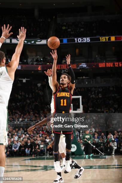Trae Young of the Atlanta Hawks shoots the ball during the game against the Milwaukee Bucks on November 14, 2022 at the Fiserv Forum Center in...