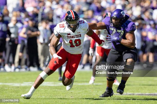 Texas Tech Red Raiders linebacker Tyree Wilson works around the block of TCU Horned Frogs offensive tackle Brandon Coleman during the college...