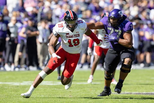 Texas Tech Red Raiders linebacker Tyree Wilson works around the block of TCU Horned Frogs offensive tackle Brandon Coleman