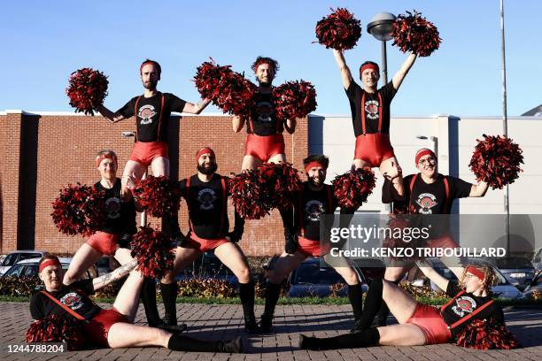 Members of the French men's cheerleading squad "Scrimmage People", a male-only roller derby pom-pom boys team, rehearse before their show at the...