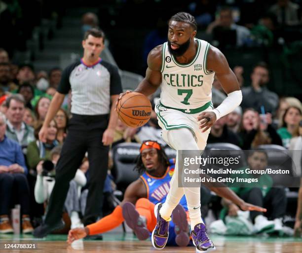 November 14: Isaiah Joe of the Oklahoma City Thunder falls behind Jaylen Brown of the Boston Celtics during the first half of the NBA game at the TD...