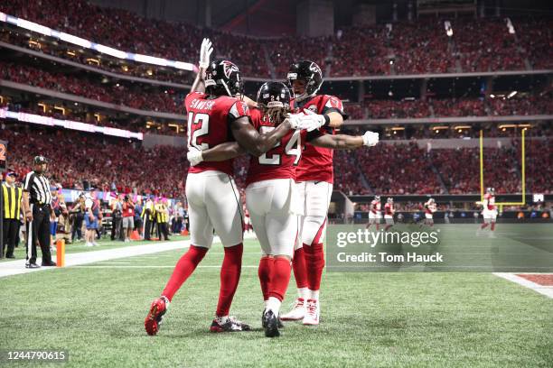 Atlanta Falcons running back Devonta Freeman celebrates a touchdown with Atlanta Falcons quarterback Matt Ryan and Atlanta Falcons wide receiver...