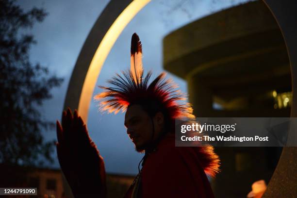 Native American veterans, among them Hamilton Tongkeamha from the Kiowa tribe in Oklahoma, gather at the National Native American Veterans Memorial...