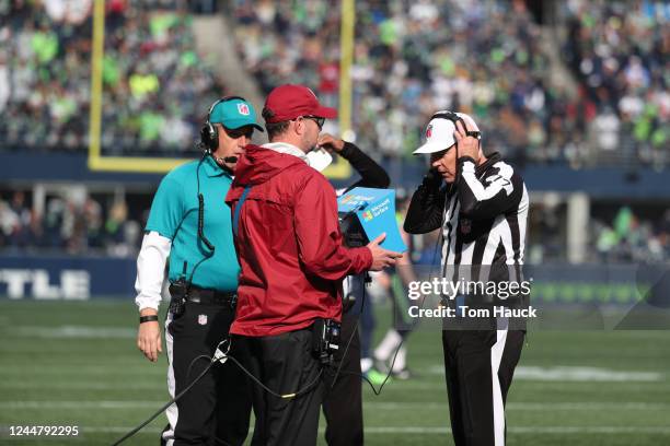 Referee Terry McAulay looks at the replay on the Microsoft Tablet viewing station during an NFL football game between the Houston Texans against the...