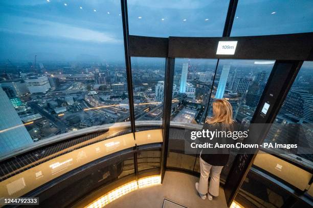 Person looks out over the VNEB constructions from Lift 109 at Battersea Power Station, combining an exhibition space, housed in the former power...