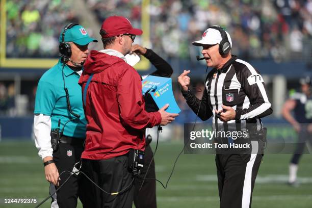 Referee Terry McAulay looks at the replay on the Microsoft Tablet viewing station during an NFL football game between the Houston Texans against the...