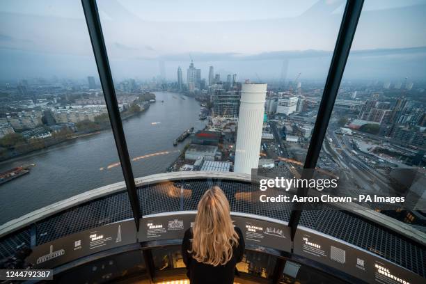 Person looks out over the VNEB constructions from Lift 109 at Battersea Power Station, combining an exhibition space, housed in the former power...
