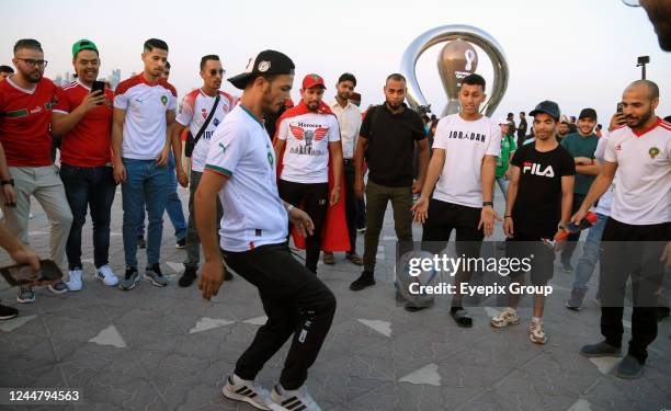 Moroccan fans attend Doha Corniche, a popular tourist site. Football fans from all over the world begin to arrive in Qatar to enjoy the matches and...