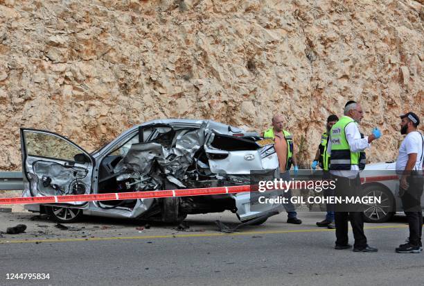 Israeli forensic check the scene of an attack in the Ariel Industrial Zone in the occupied West Bank on November 15 in which a Palestinian killed two...