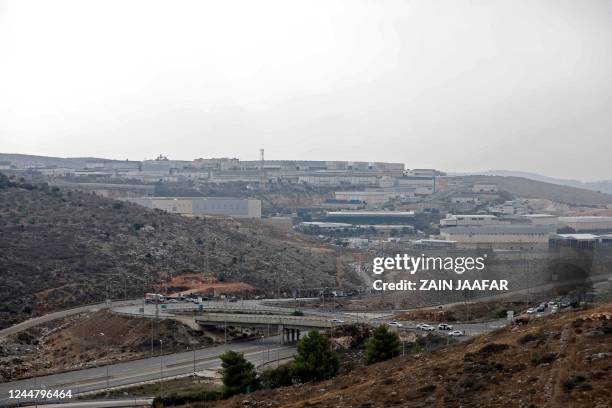 Picture taken from Palestinian village of Salfit shows a general view of the area surrounding the spot where an attack took place in the Ariel...