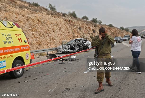 Israeli forces and medics check the scene of an attack in the Ariel Industrial Zone in the occupied West Bank on November 15 in which a Palestinian...